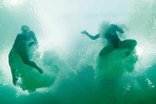In this picture taken with an underwater camera Malaysia's duet Jun Hoong Cheong and Pandelela Rinong Pamg compete in the Women's Synchronised 10m Platform Final during the diving event at the Rio 2016 Olympic Games at the Maria Lenk Aquatics Stadium in Rio de Janeiro on August 9, 2016.   / AFP PHOTO / FRANCOIS XAVIER MARIT