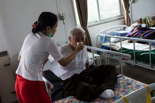  AFP PHOTO / Ye Aung THU / TO GO WITH 