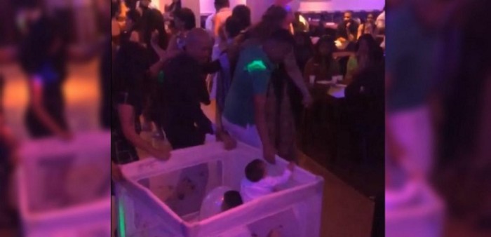 Padre es grabado en encendida fiesta junto a sus hijos recién nacidos y generó debate en Internet