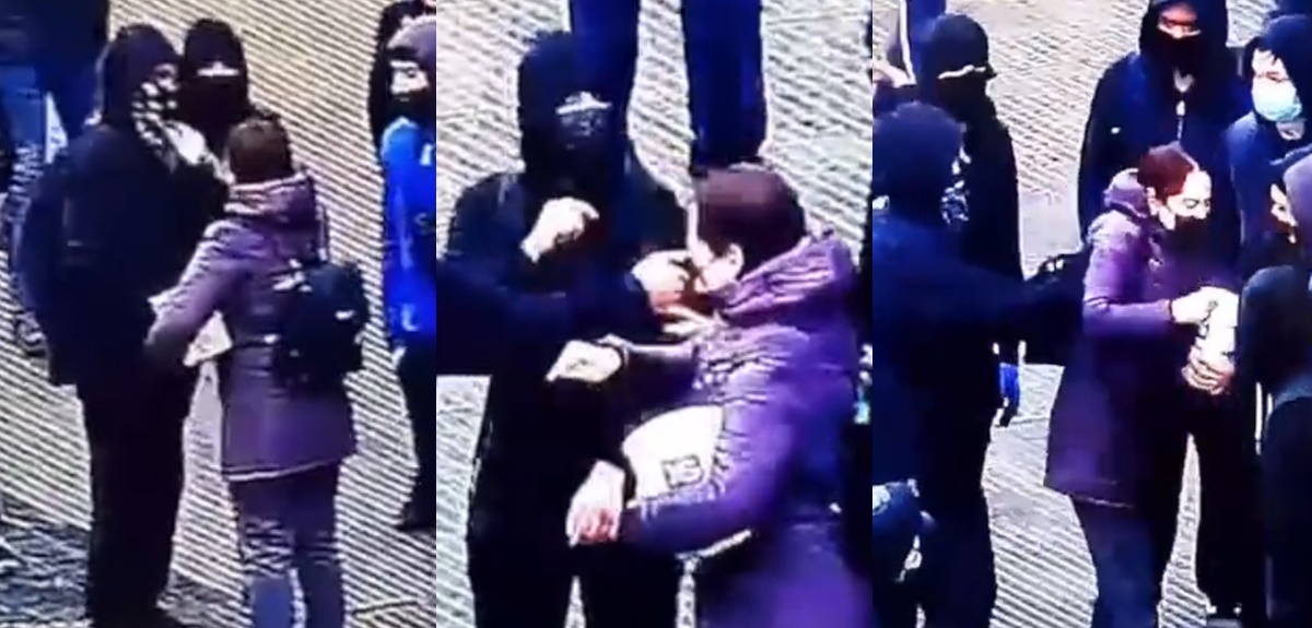 Captan momento en que encapuchados golpean a mujer en medio de manifestaciones en Santiago