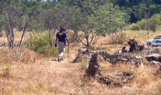 Hallan cuerpo apuñalado, mutilado y quemado en predio de Pelarco