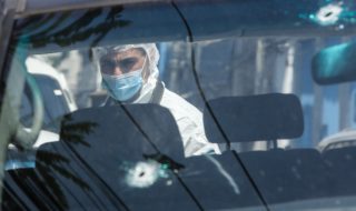 Encuentran auto 40 impactos de bala Santiago Centro
